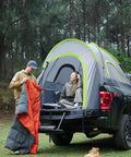 Five Foot Pickup Truck Tent 2.0 Double Layer Waterproof PU2000MM setup on truck bed with two people camping in forest