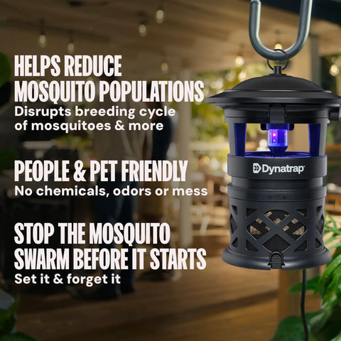 Half Acre Outdoor Mosquito And Flying Insect Trap And Killer For Your Backyard Attracts Mosquitoes Flies Wasps Gnats And More Weather Resistant Bug Zapper Alternative Black installed and glowing in a backyard.