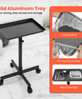 Rolling Salon Cart With Wheels Mobile Styling Station Aluminum Tray Trolley For Salon Essentials Adjustable Height Hairstylist Tray With 10 Disposable Covers Portable And Durable showing black tray on wheels with cover inserts.