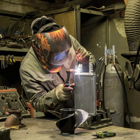 Welder using Dual Output Argon and CO2 Regulator Flowmeter for TIG and MIG Welders in workshop setup