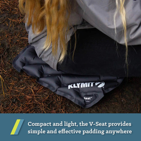 Person sitting on V Seat Inflatable Cushion For Travel, Camping, Backpacking And Bleachers, Portable Comfy Padded Seat.