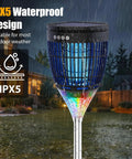 Solar Mosquito Zapper Outdoor With Flame Lamp And Projector Light 4200V Electric Bug Killer in a rainy garden setting