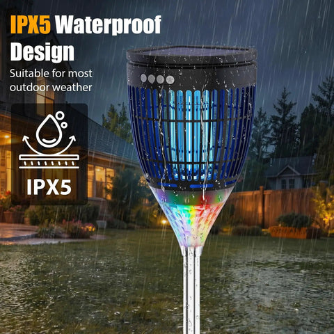 Solar Mosquito Zapper Outdoor With Flame Lamp And Projector Light 4200V Electric Bug Killer in a rainy garden setting