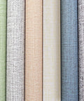 Assorted rolls showing colors and textures of cream linen textured peel and stick wallpaper roll 10ft long beige faux grasscloth self adhesive wall covering for cabinets and countertops removable and easy to install on smooth surfaces.