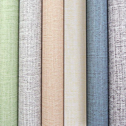 Assorted rolls showing colors and textures of cream linen textured peel and stick wallpaper roll 10ft long beige faux grasscloth self adhesive wall covering for cabinets and countertops removable and easy to install on smooth surfaces.