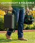 Person carrying Foldable Garden Kneeler Seat Bench With Cross Body Tool Bag And Removable Pouch in a garden setting.