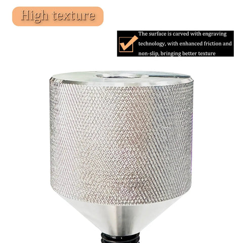 Close-up of stainless steel tool with engraved non-slip texture surface, showcasing high texture and durability.