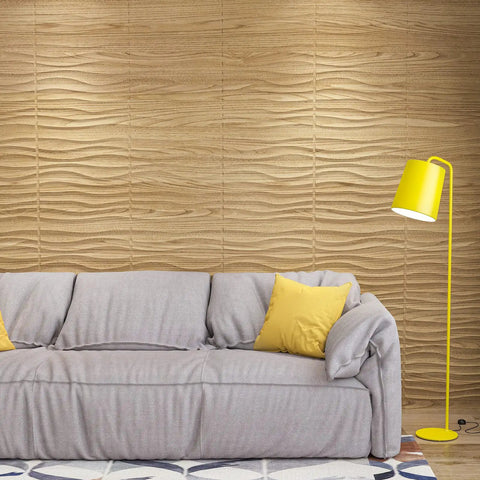 PVC 3D Wave Wall Panels Wood Brown Texture for Interior Decor behind gray sofa with yellow pillows and lamp