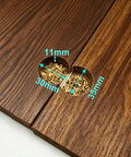 Close-up of wood surface with drilled holes for 2Pack 90 Degree Hidden Flush Mount Hinges For 90 Degree Opening, Concealed Drop Down Hinge.