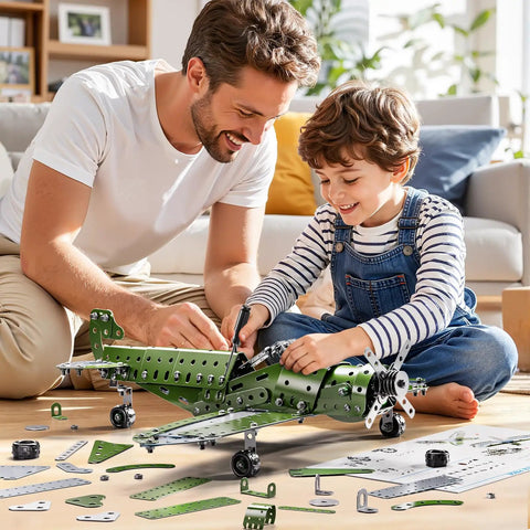 Father and son building Metal Model Airplane Kit For Kids Ages 8 12, STEM Building Toy With 285 Parts And Tools on floor