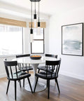 Three Light Kitchen Island Pendant In Matte Black Finish With Clear Glass Cylinder Shades And Bubble Crystal Orbs above dining table