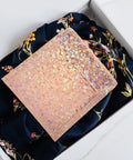 Rose gold 20 Pack Air Cushion Mailers 15x13cm self sealing padded shipping bags for clothes over floral fabric in box
