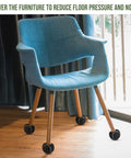 Heavy Duty Precut Tennis Ball Chair Leg Covers 150 Piece Black Bundle on chair legs for smooth rolling without scratches.