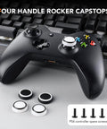 Xbox controller with capstops, PS4 controller spare screws on table