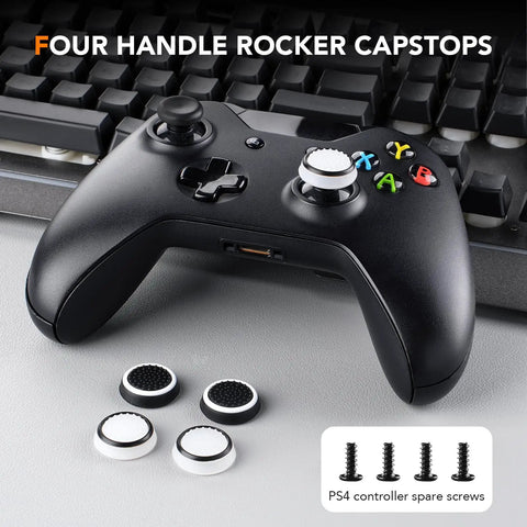 Xbox controller with capstops, PS4 controller spare screws on table