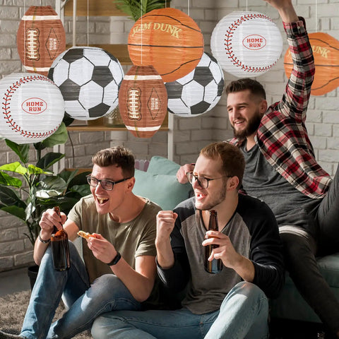 8 Pack 12 Inch Sports Paper Lanterns Set for Party Decor Includes Soccer Ball Basketball Baseball American Football and Japanese Hanging Lanterns Reusable Game Day Birthday Favors for Kids displayed at party
