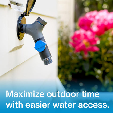 Comfort Grip VB Hose Connector with Vacuum Breaker attached to outdoor hydrant, ergonomic no slip grip, slate gray