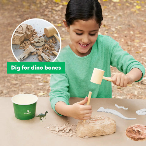 Dinosaurs Fossil Dig Kit For Kids Ages 6 And Up, Real World Science Excavation And Skeleton Assembly, Dig Up Bones, Build A Full Dino Replica With Mini Dinosaurs, Modeling Clay, Plaster, And Geologic Timescale Facts Poster; child digging fossil block
