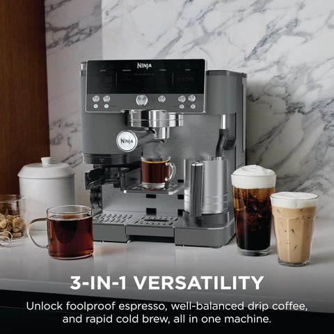 Brew Like A Pro At Home With This Triple Threat Espresso And Drip Coffee Maker Featuring Rapid Cold Brew Options Alongside Reliable Dual Shot Settings In Sleek Gunmetal Finish on a kitchen counter.