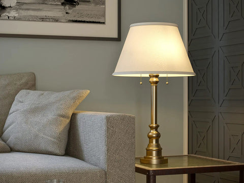 Spyglass Table Lamp With Antique Brass Finish Dope Retro Modern Classic Vibe Linen Shade 30.5 Inch Tall in living room