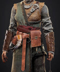 Dual Brown Renaissance Belt Pouch And Viking Bracer Kit Featuring Detachable Waist Bag With Heavy Duty Hook Strap As Legit Everyday Carry Piece Crafted For Medieval Festival Costumes And Chill Hangout Sessions Or Badass Halloween Bash Gear, worn by model showcasing pouch, belt, and bracers.