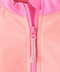 Close-up of pink half-zip on Baby Girls And Toddlers Long Sleeve Rashguard Swimsuit Half Zip One Piece In Happy Pink With UPF 50 Sun Protection Colorblock 80 20 Recycled Polyester Spandex Lined Jersey Size 5 Years Kid Friendly Swimwear.
