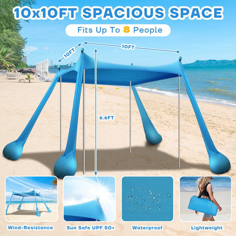 Spacious 10x10 Foot Beach Shade Canopy With UPF50 Plus Sun Protection Pop Up Shelter set up on sandy beach with clear blue sky.