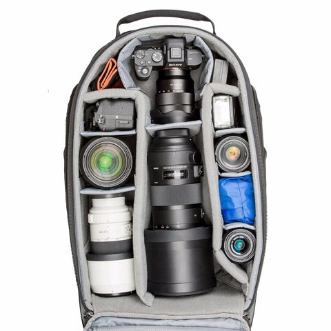 Interior view of Streetwalker Rolling Camera Backpack With Dedicated Laptop Pocket And Minimalist Black Exterior, organized for photographers