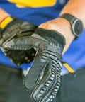 Close-up of MPact Impact Resistant Work Gloves With D3O Palm Padding, Touchscreen Ready, Black, Large in use.