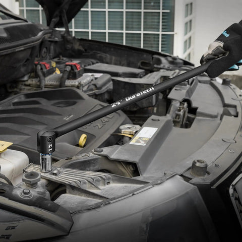 Rugged 24 Inch Breaker Bar Featuring 240 Degree Flex Head And Half Inch Square Drive in use on a vehicle engine.
