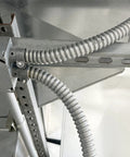 Three Quarters Inch Galvanized Steel Flexible Electrical Conduit 25 Ft Roll connected in metal framework