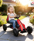 Child riding Kid Pedal Go Kart For Outdoors With Adjustable 4 Position Seat Swing Axle Handbrake And Non Slip EVA Wheels Ride On Toy For Boys And Girls Ages 3 To 8 Red on garden path