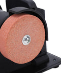 Close-up of coarse grind wheel on a cordless mini bench grinder for fast rust removal.