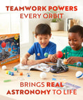 Children assembling the Epic Solar System Model Kit For Kids With 4 Speed Motor And HD Planetarium Projector on a table.