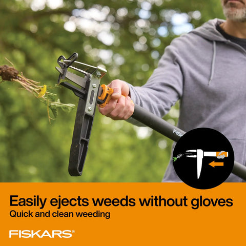 Person using Stand Up 3 Claw Weed Puller With 39 Inch Ergonomic Handle And Easy Eject Mechanism in garden.