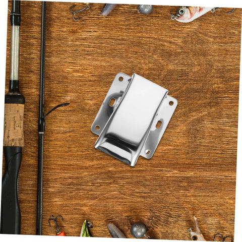 Front view of stainless steel fish cleaning clamp with mounting flanges on wooden workspace.