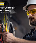Electrical technician using pliers with EdgeConnect™ Technology for fast terminating devices in a workshop.