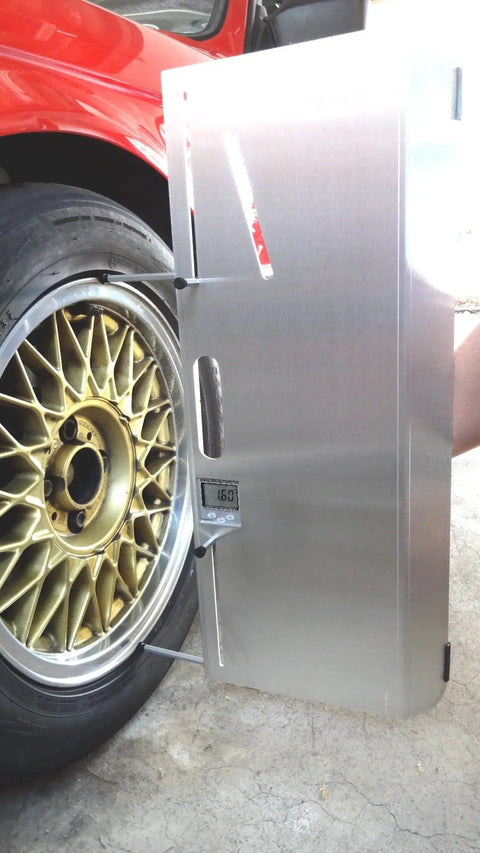 Heavy Duty 2 Wheel Alignment Tool For Camber Caster And Toe with precision standoffs aligned against a golden wheel.
