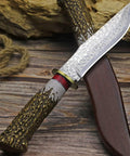 Damascus Steel Hunting Knife With Faux Antler Handle, 5.4 Inch Fixed Blade Skinner For Camping And Survival on wooden sheath