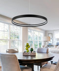 Black One Ring LED Chandelier Dimmable Modern Pendant Light hanging over dining room table in contemporary setting