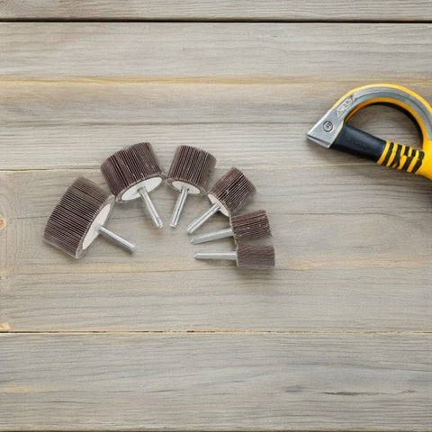 Super Cool 12 Piece Cylindrical Flap Wheel Set For Metal Die Grinding And Polishing Tasks With Sturdy Shank And Smooth Operation To Buff Your Projects Like A Pro Today displayed on a wooden surface.