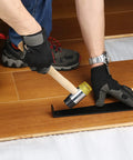 Person installing wooden floor wearing Flat Knee Pads For All Kneeling Jobs, Heavy Duty Knee Cushions with Anti Skid Grip and Adjustable Clips