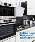 Super Tough Fifty Foot Heavy Duty Gray Appliance Extension Cord With Flat Plug Ideal For Air Conditioner Fridge Microwave And All Your Big Appliances Fourteen Gauge High Voltage Three Prong Cord For Indoor Use used in modern kitchen with oven and appliances.
