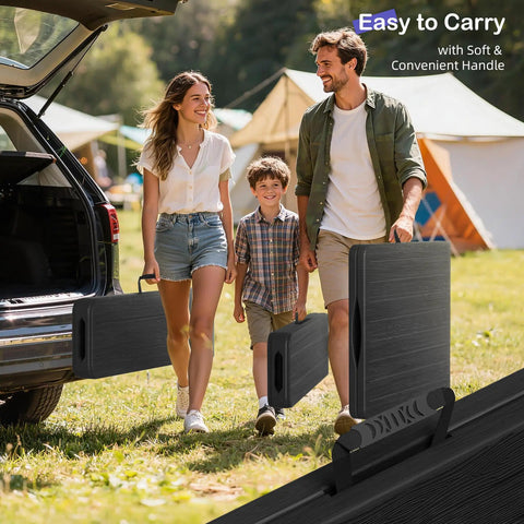 Family carrying Six Foot Folding Picnic Table Set With Two Benches HDPE Wood Pattern Top Portable with handle at a campsite.