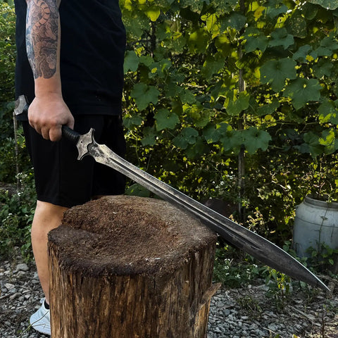 Person holding Hand Forged Knight Sword In Spring Steel 35 Inch Full Tang Medieval Blade Built For Realistic Battle Vibe