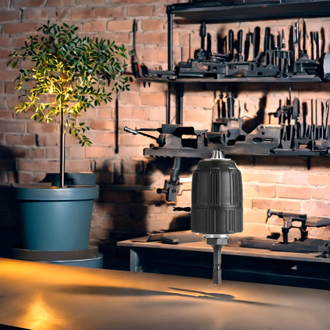 No Fuss Quick Swap 1/2 Inch Drill Chuck Adapter For Impact Drivers on a workbench against a brick wall backdrop.