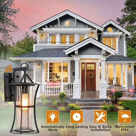 Dusk To Dawn Matte Black Outdoor Wall Light With Seed Glass on house exterior showcasing evening illumination