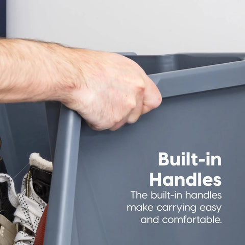 Close-up of a gray Heavy Duty Open Front Storage Bin with a hand holding the large handle, showcasing its stackable design.