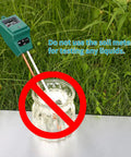 Image of a 3 In 1 Soil Moisture Light And PH Tester with a green case, warning against using it to test liquids, outdoors on grass.