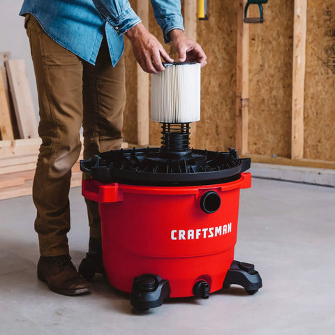 Man installing Versatile Wet Dry Vacuum Filter Cartridge For 5 Gallon And Larger Shop Vacuums With Quick Lock System